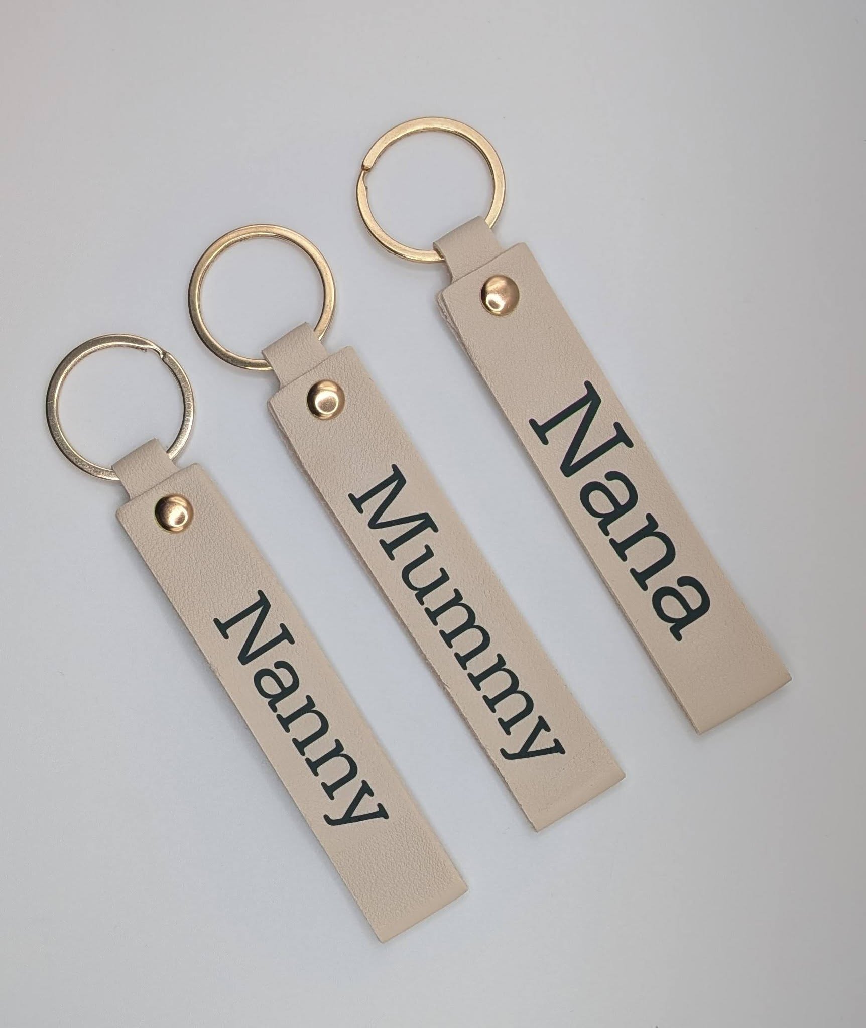 Collection of assorted custom handcrafted keyrings